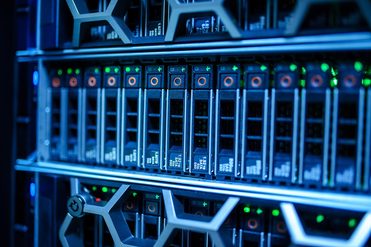Rows of network servers with status lights in a data centre